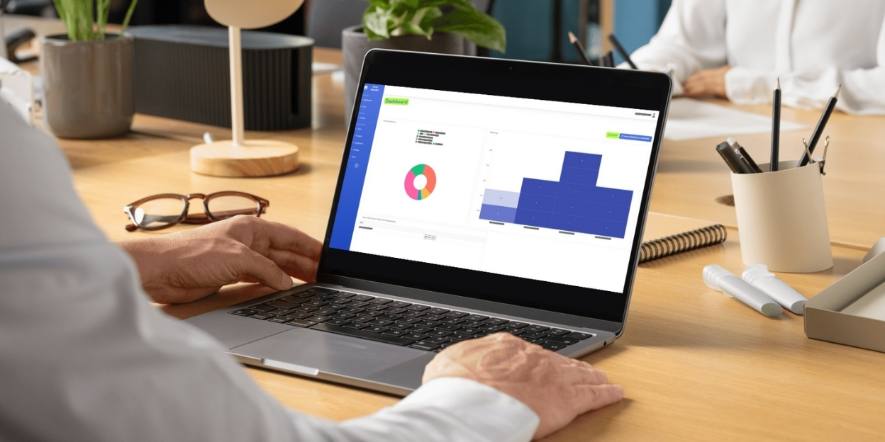 Businessman using the Simple Timesheet’s interactive dashboard.